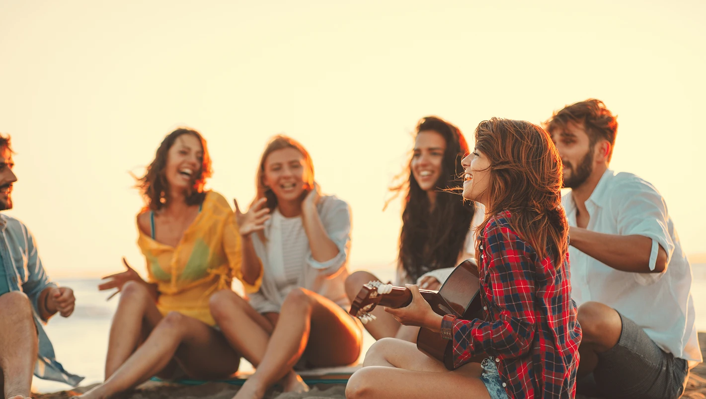 Friends gathering on the beach